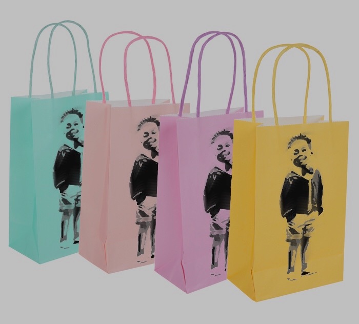 gift bags with stenciled birthday boy image