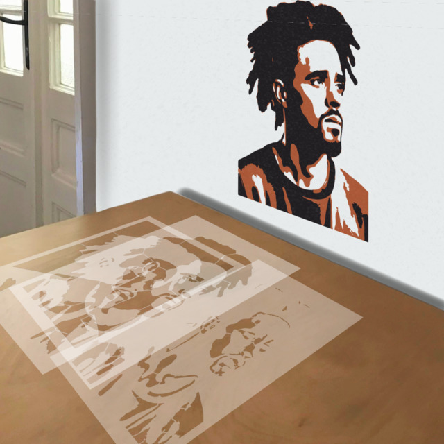 J Cole stencil in 3 layers, simulated painting